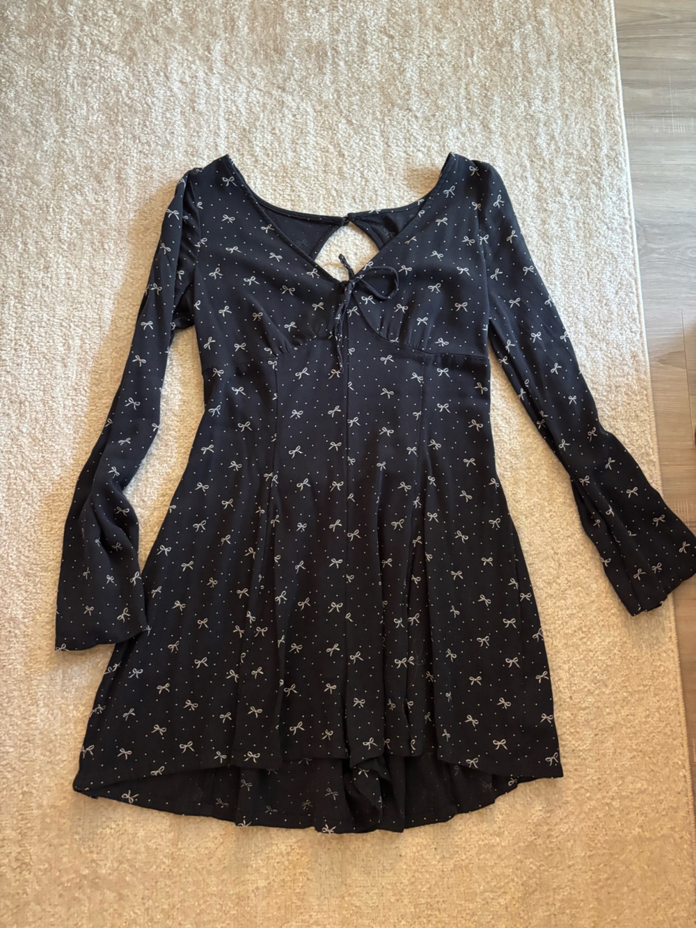 American Eagle Outfitters Black V-Neck Romper with White Bow Print